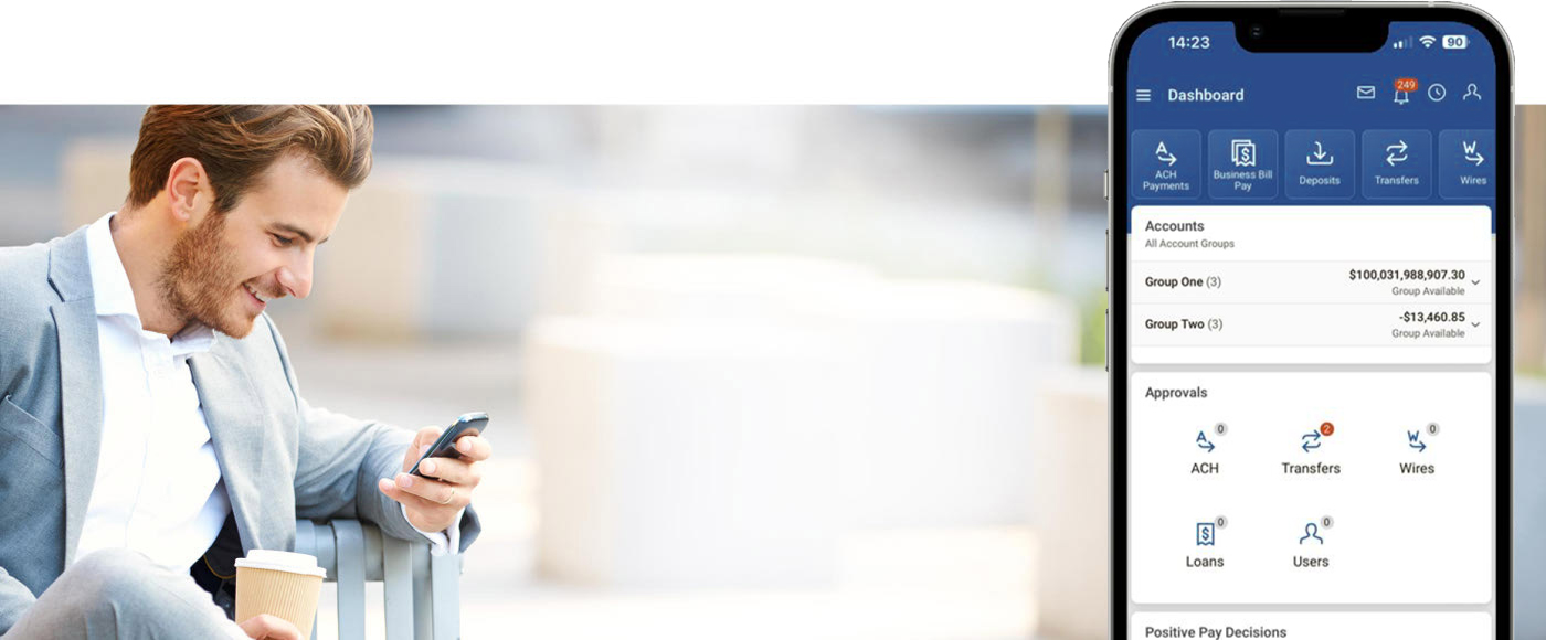 Business man on mobile phone with FirstBank mobile phone app image