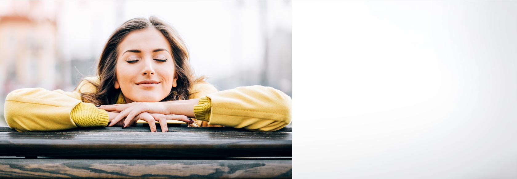 Young girl with happy and contented look on her face