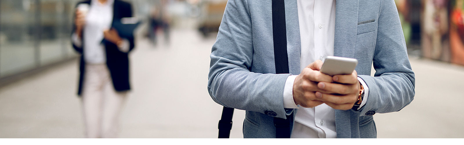 man checking his bank statement on a mobile device